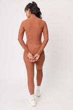 Chamarra deportiva Jacket Elan Cocoa para mujer vista trasera