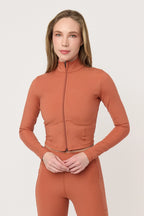 Chamarra deportiva Jacket Stone Terracota para mujer vista frontal