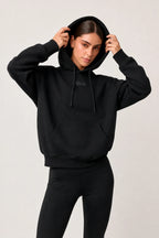 Hoodie unisex Beat negra con capucha para mujer
