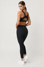 Legging Pace negro para mujer vista trasera