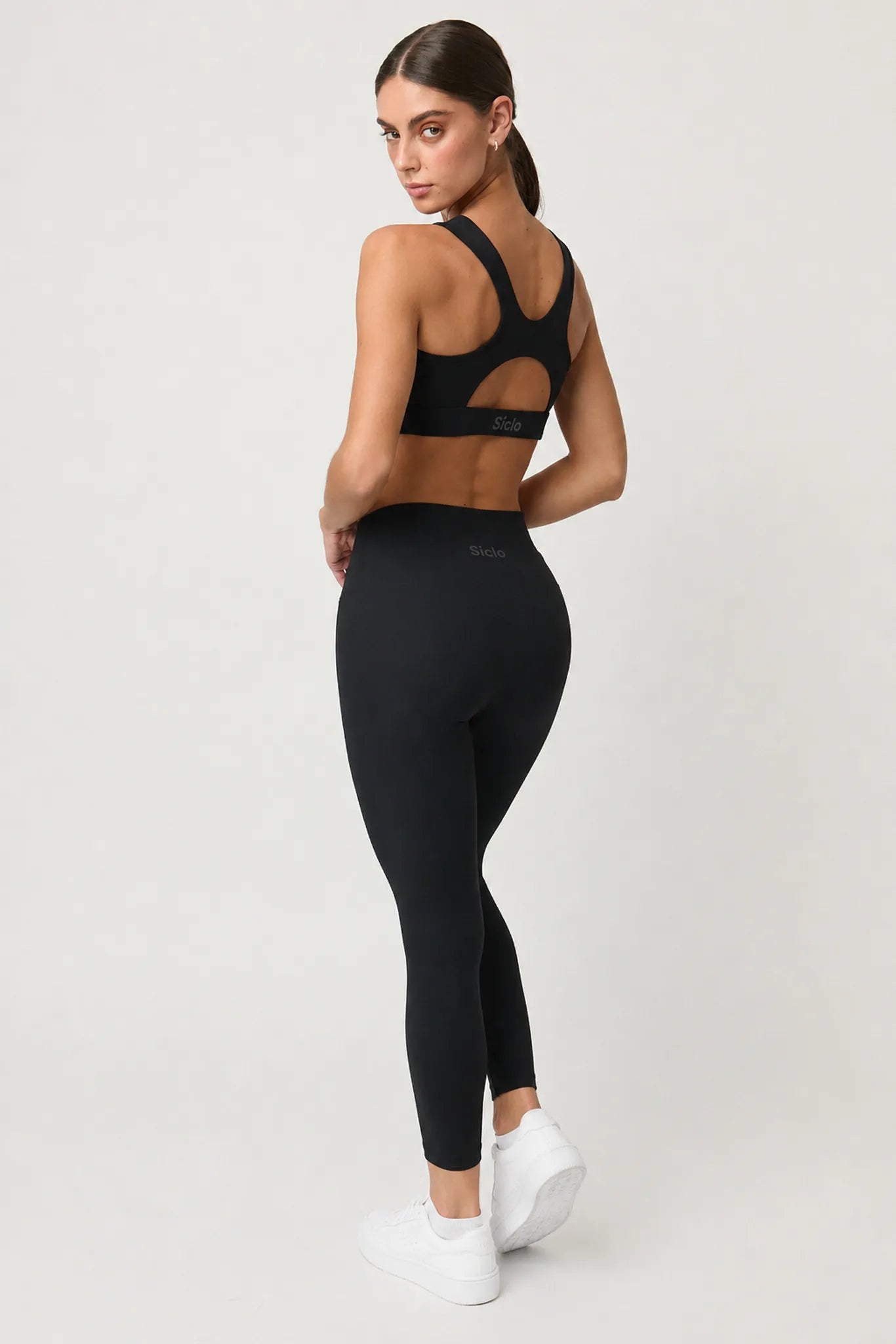 Legging Pace negro para mujer vista trasera