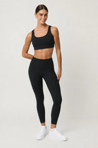 Legging deportivo Pace negro para mujer vista frontal
