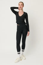 Torera deportiva Ivory negra para mujer vista frontal