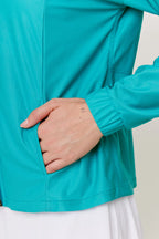 Sudadera Sunshine color Teal Blue de Gymco, chamarra deportiva ajustable mujer